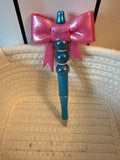 Large pink bow ink pen