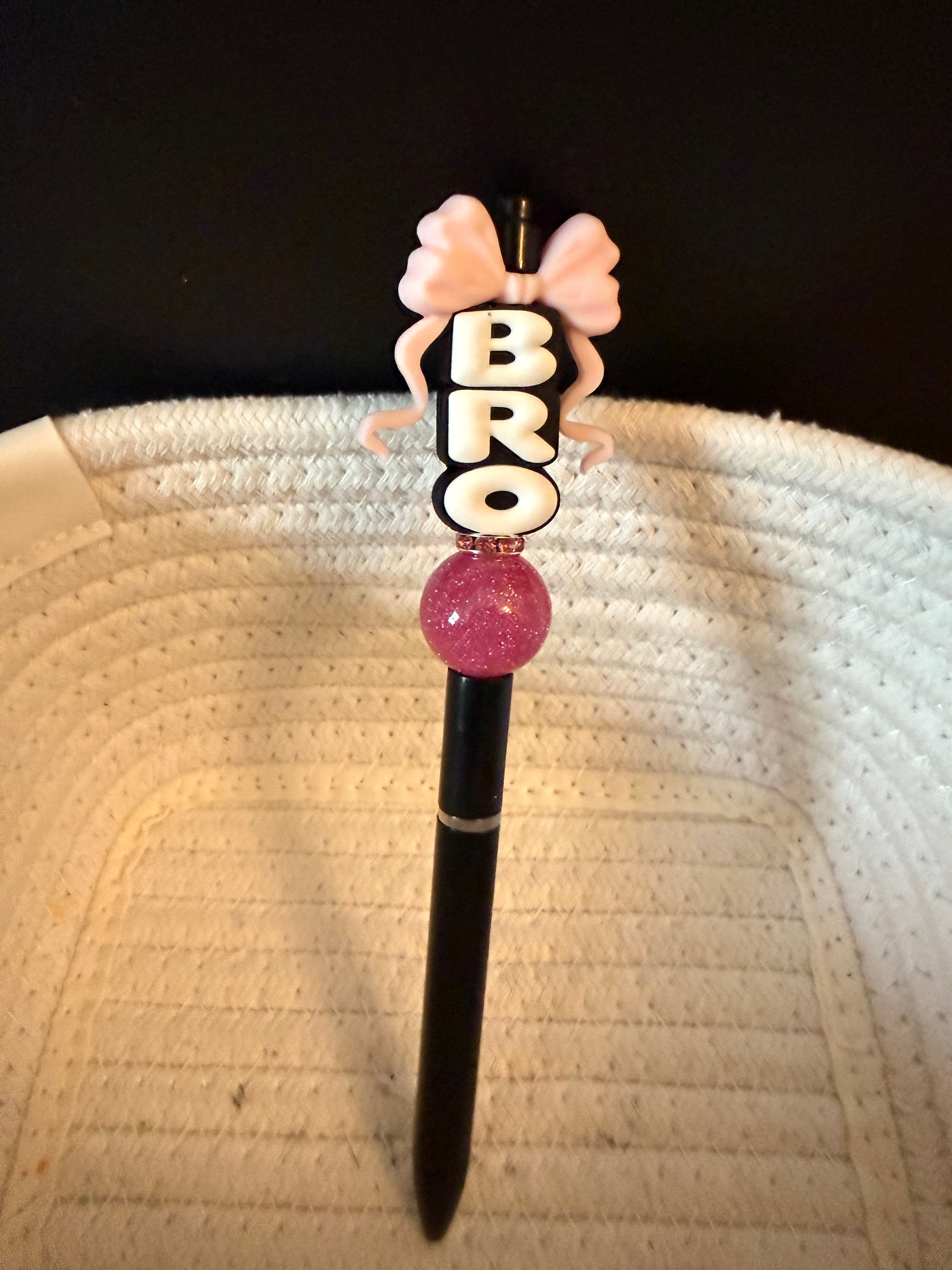 BRO with pink bow ink pen