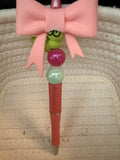Bookworm with large pink bow ink pen