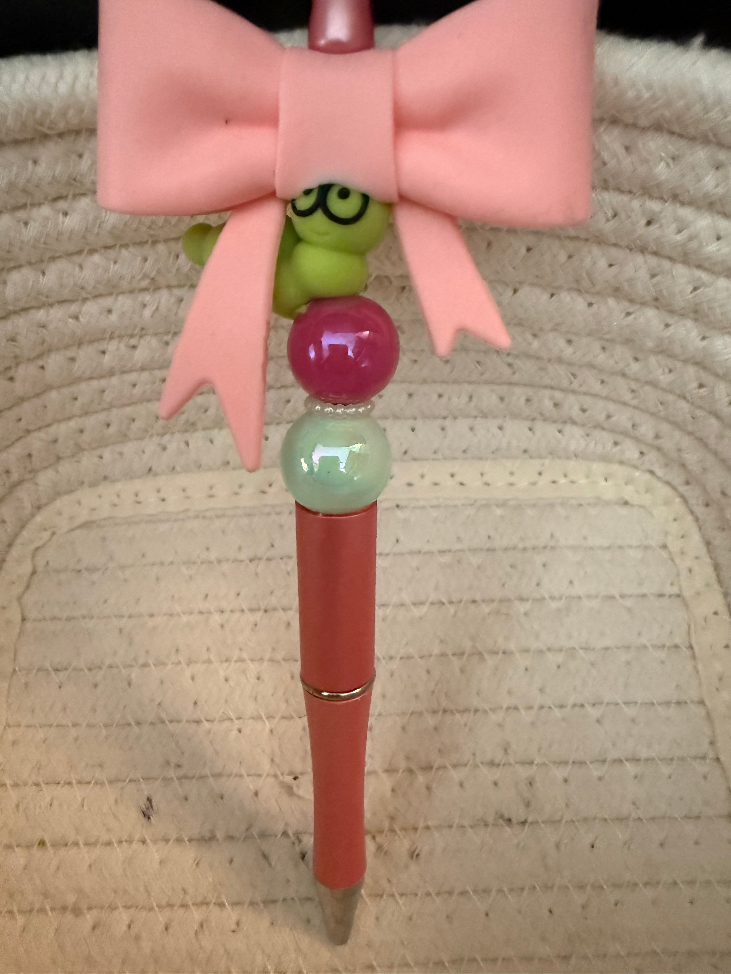 Bookworm with large pink bow ink pen