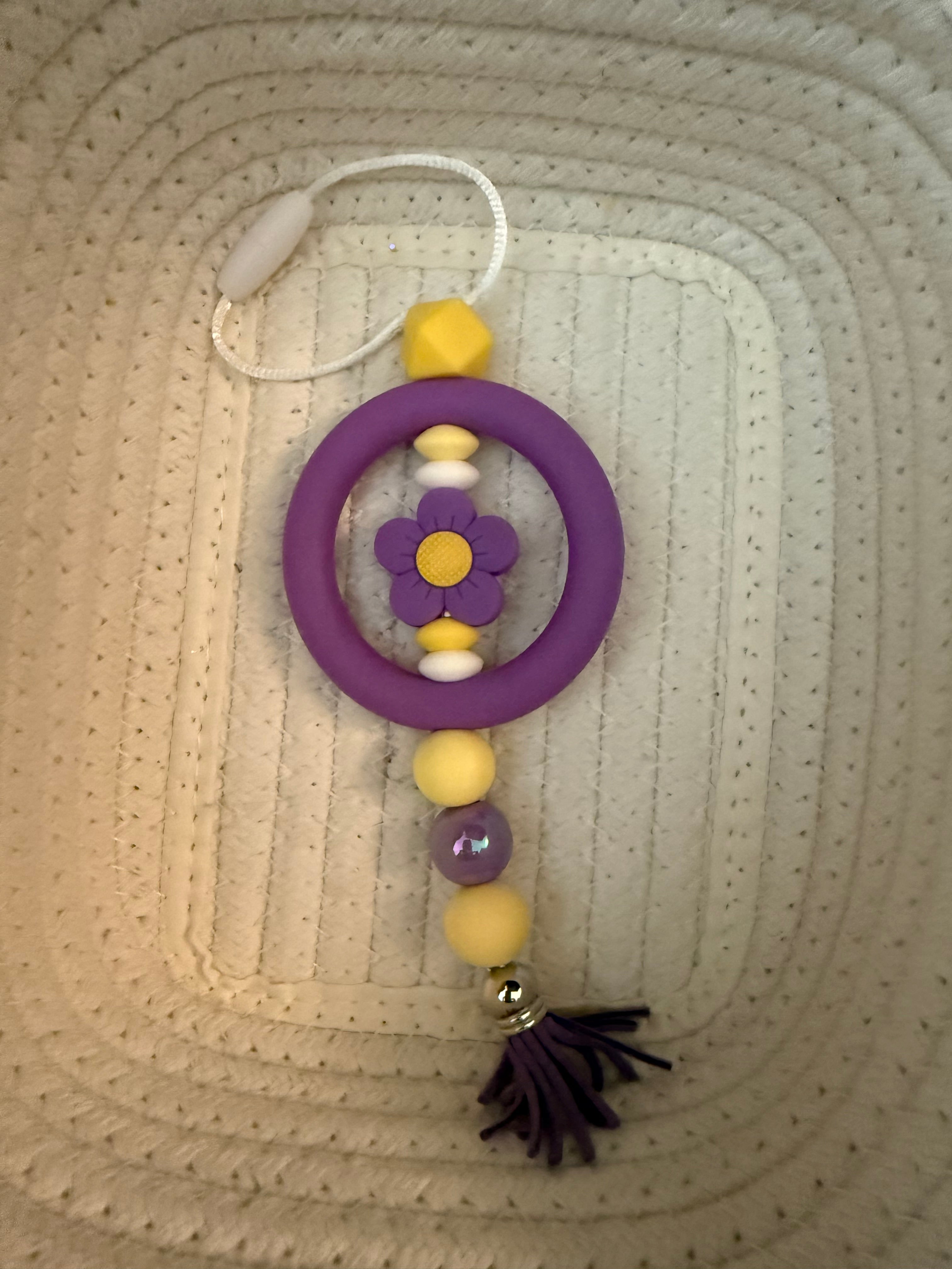 Purple daisy cat charm