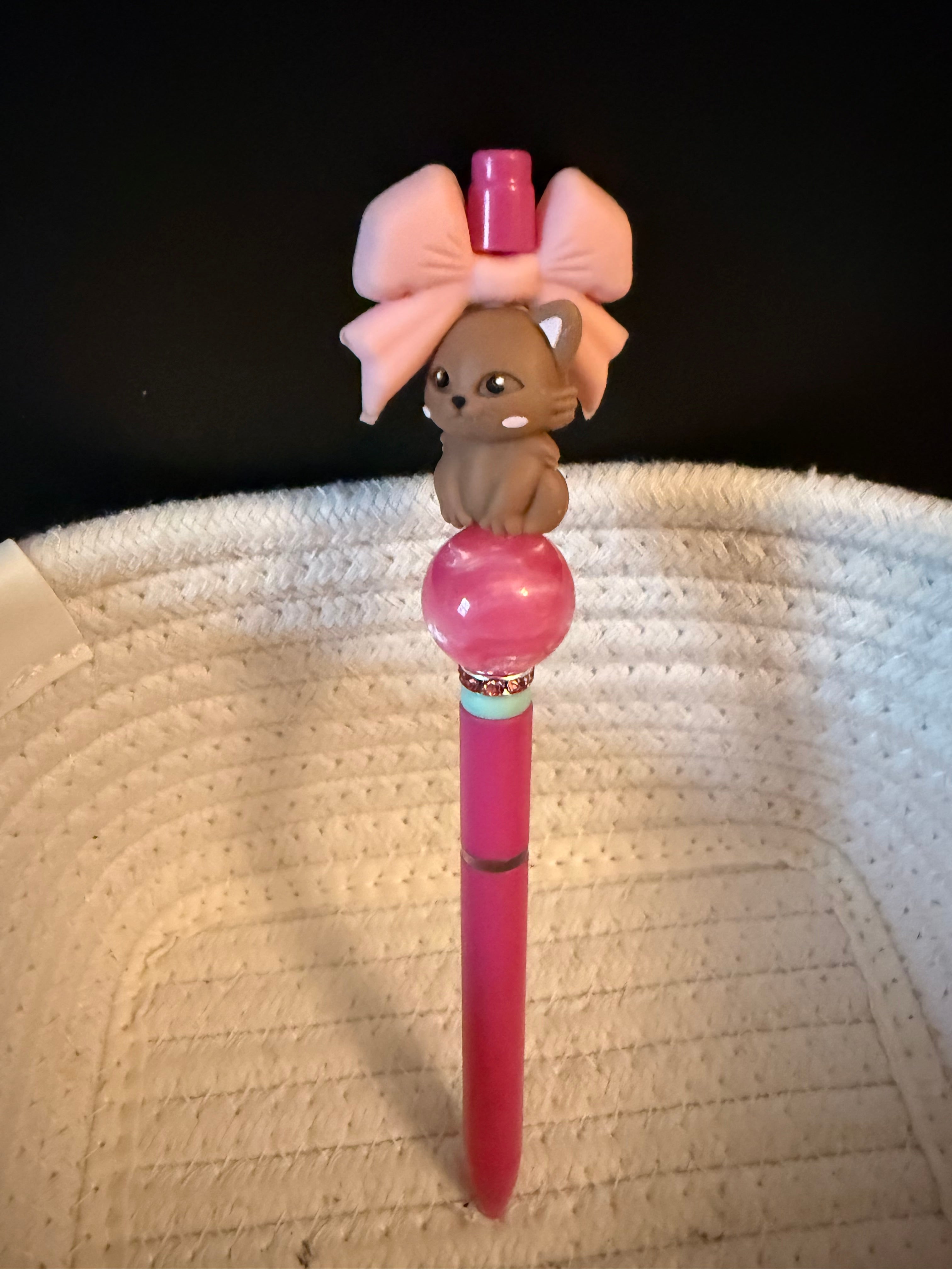 Brown cat with pink bow ink pen